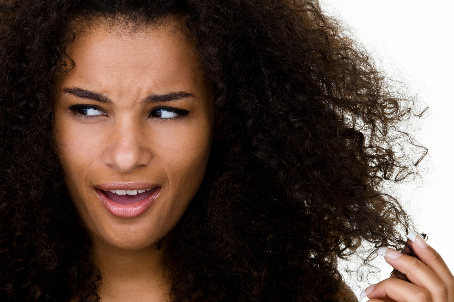 Shocked woman with curly hair